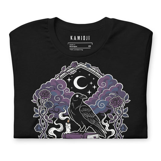 witchy crow graphic tee with gothic raven perched on stacked books and ritual symbols