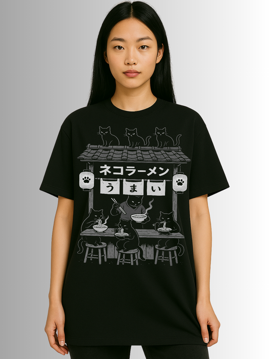Black T-shirt featuring Japanese “Neko Ramen” design with cats eating noodles at a ramen stall