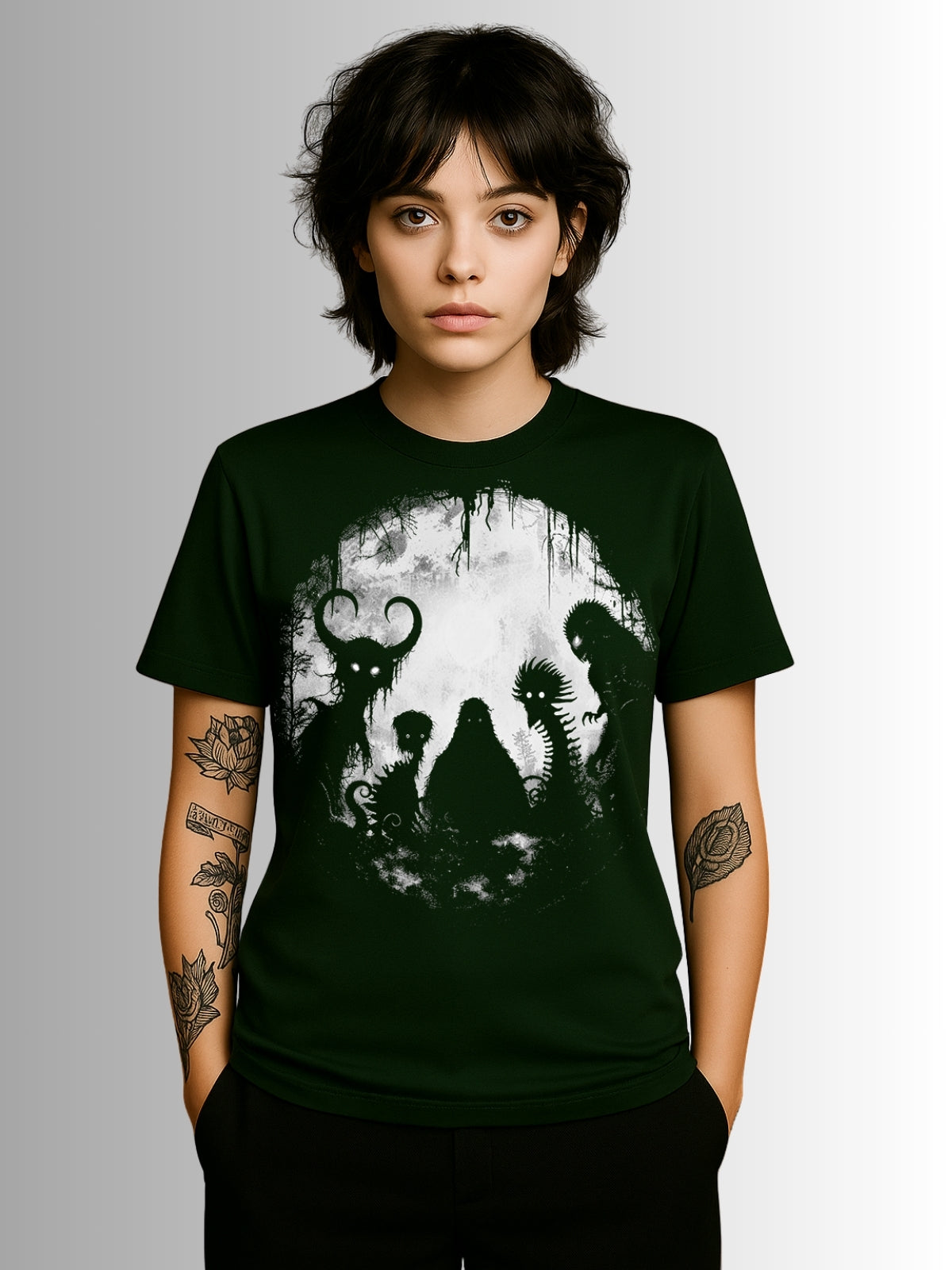 Dark green alternative tee showcasing a lineup of cryptid legends in bold monochrome print