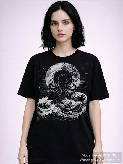 Gothic black tee showcasing detailed octopus tentacles emerging from turbulent sea with moonlit backdrop