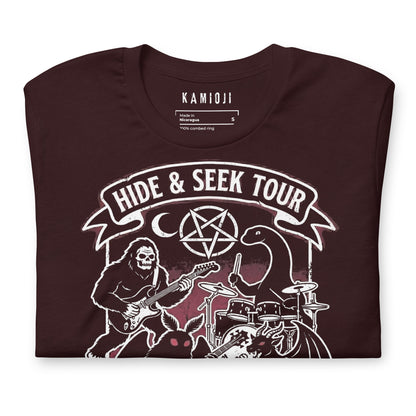 Alternative graphic t shirt with Mothman, Sasquatch, and the Loch Ness Monster performing in a concert style design. Oxblood black color variation.