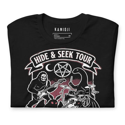 Graphic tee with Sasquatch playing guitar alongside Mothman and the Loch Ness Monster in a band scene.