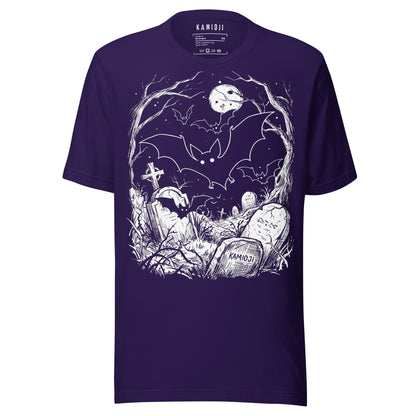 KAMIOJI Halloween T-shirt featuring bats flying over a moonlit graveyard with tombstones and pumpkins, front view | Colour: Purple