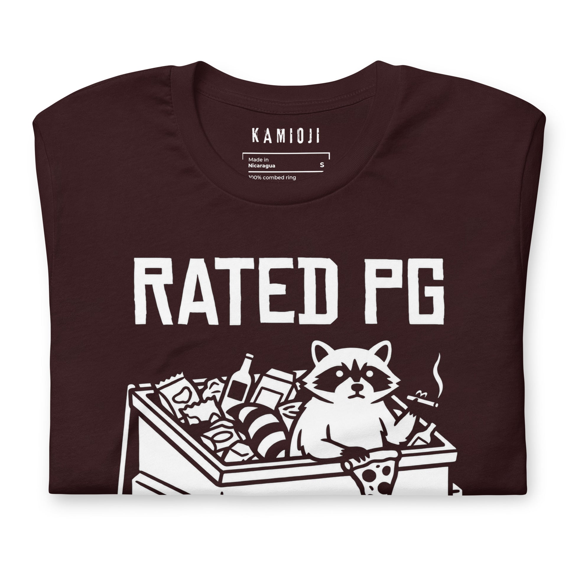 Trash panda graphic tee featuring a raccoon surrounded by junk food and garbage inside a dumpster