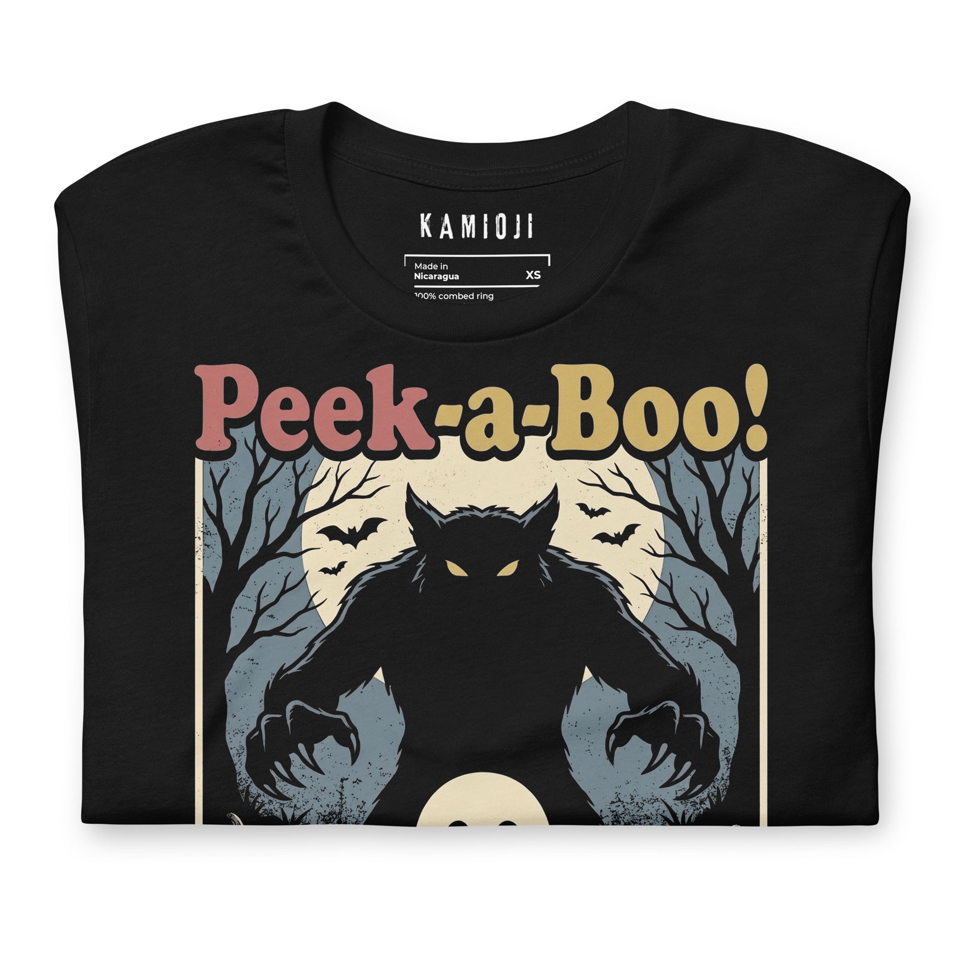 Close-up of the KAMIOJI Peek-a-Boo werewolf, ghost and pumpkin Halloween T-shirt graphic | Colour: Black