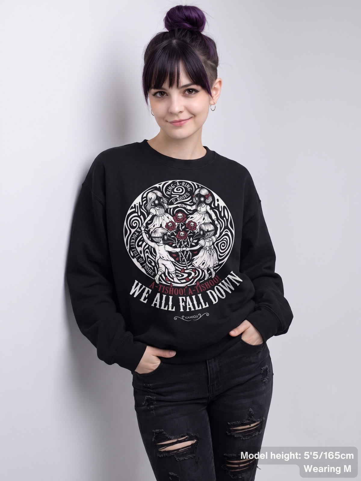 Female model wearing the KAMIOJI We All Fall Down sweatshirt with plague doctor children and skull rose artwork | Colour: Black