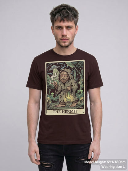 T-shirt with a detailed 'The Hermit' tarot design and the text "THE HERMIT" at the bottom of the card.