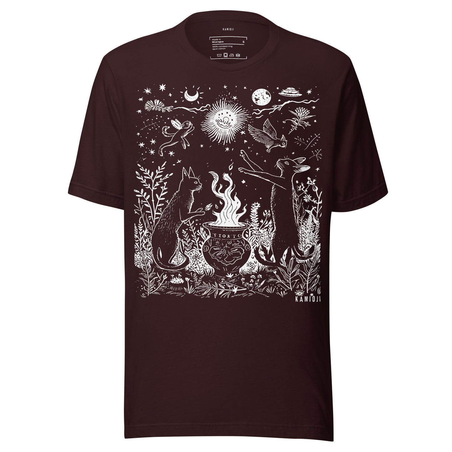 Graphic t shirt featuring intricate line art of cats, a cauldron, and night sky symbols including moons, stars, and a radiant sun. Oxblood black.