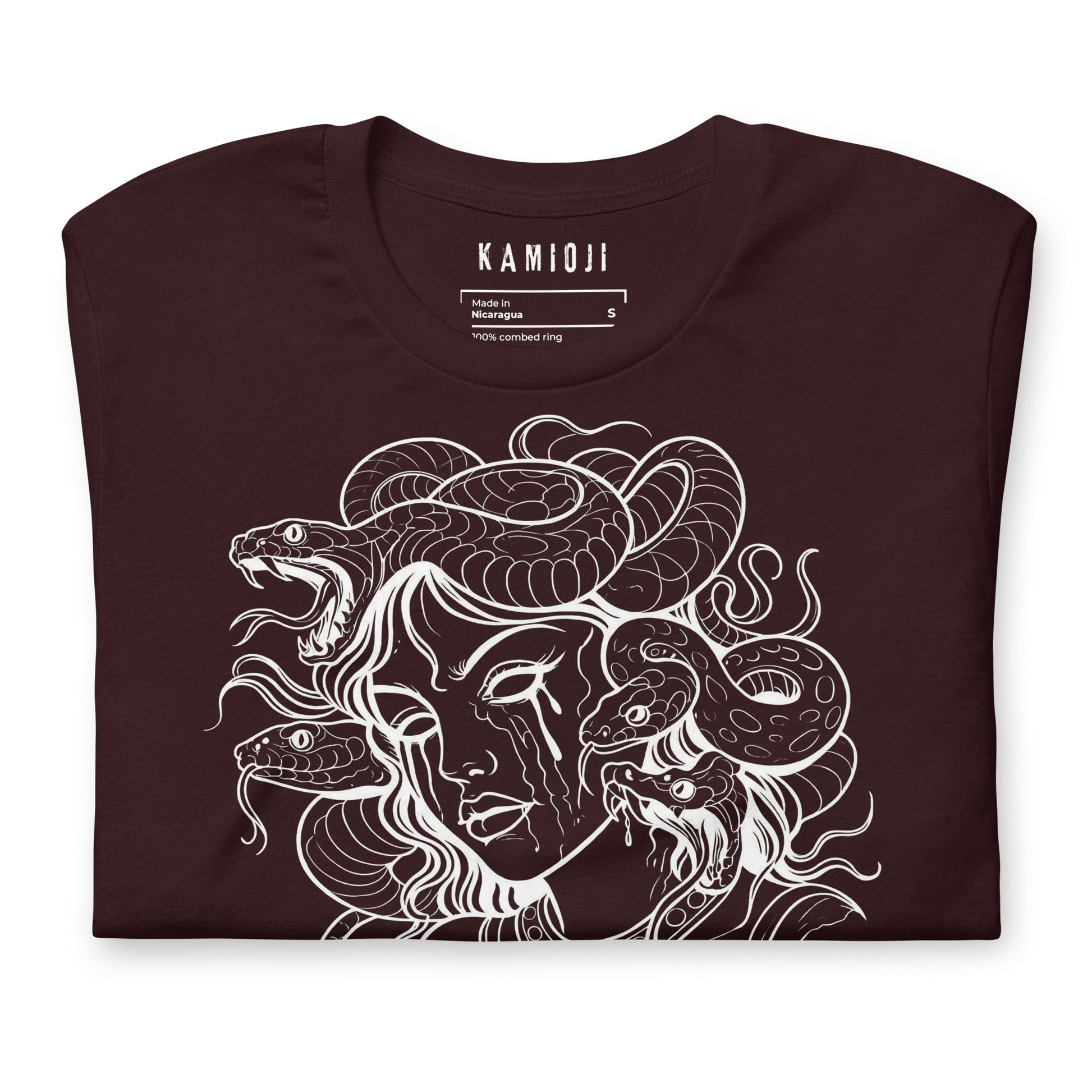 Alternative graphic tee with Medusa artwork and statement text beneath.