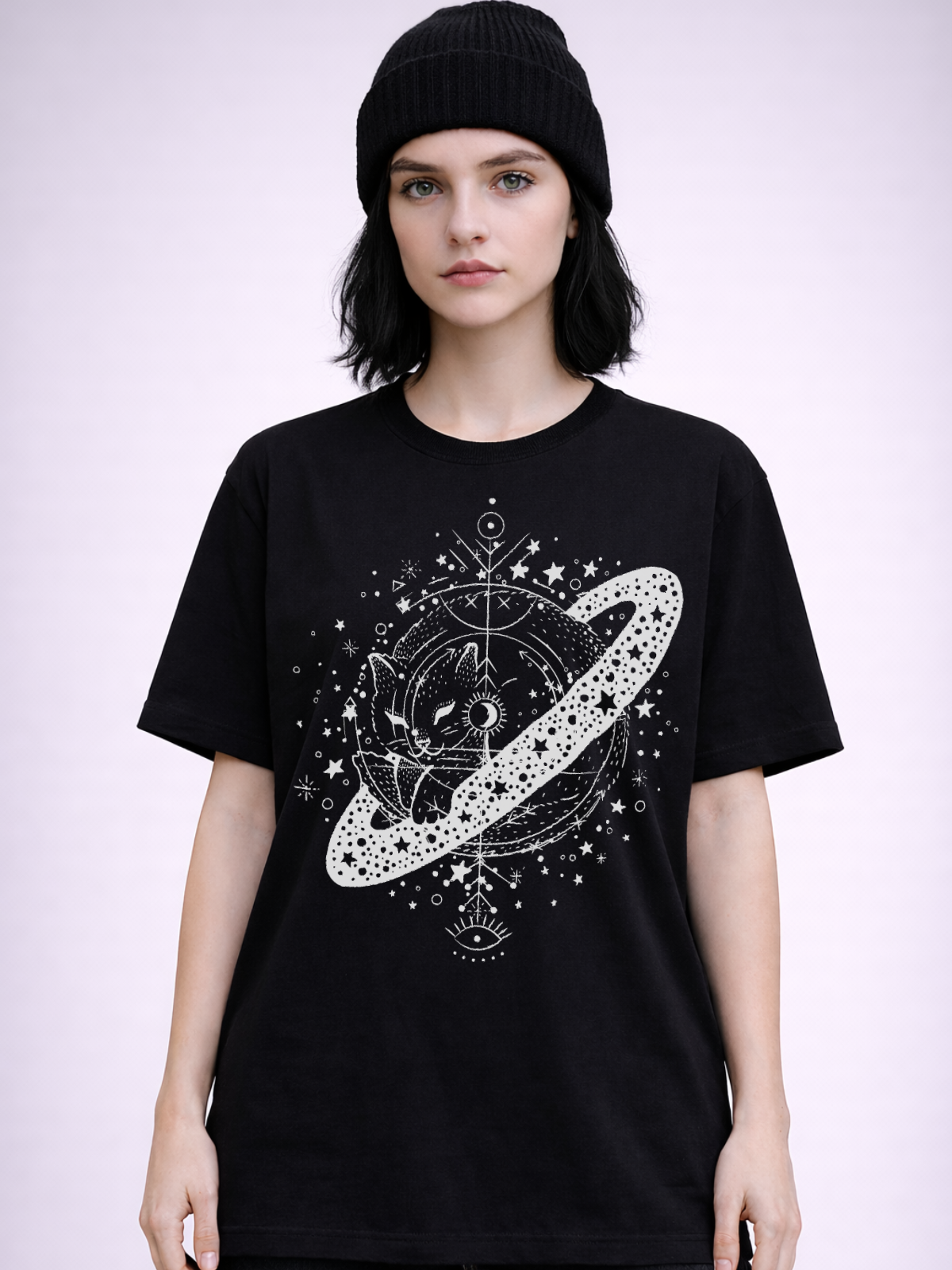 Gothic black tee with cosmic cat illustration resting on Saturn-like planet in detailed white linework