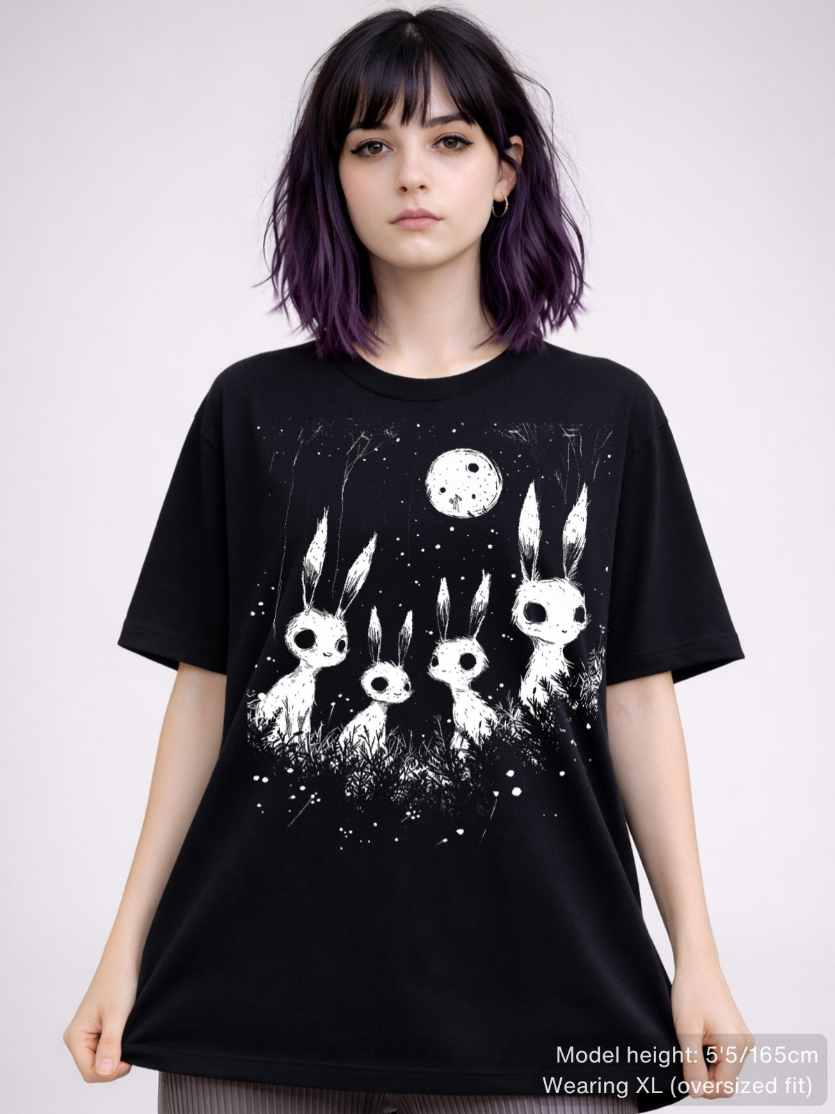 Alternative T-shirt with haunting rabbit silhouettes beneath glowing moon