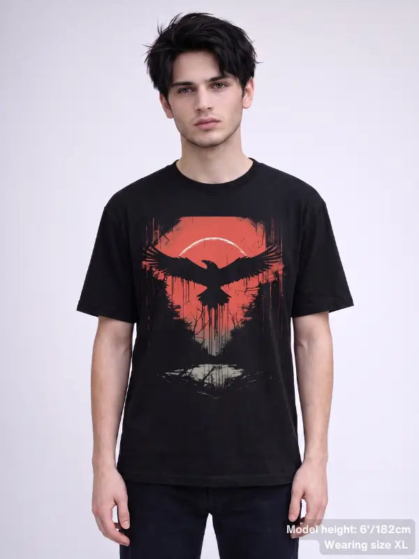 Black gothic tee showcasing a crow in flight over a crimson sky and eerie mirrored water reflection