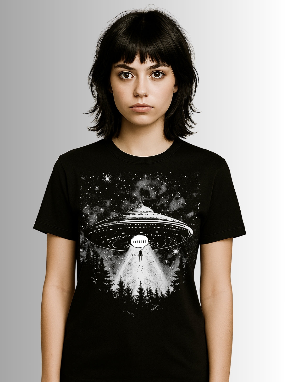Gothic black tee showcasing extra-terrestrial spacecraft beaming up a silhouette in detailed monochrome design