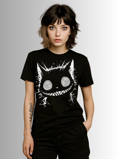 Gothic alternative tee showcasing eerie Cheshire Cat artwork with hypnotic eyes and distorted smile