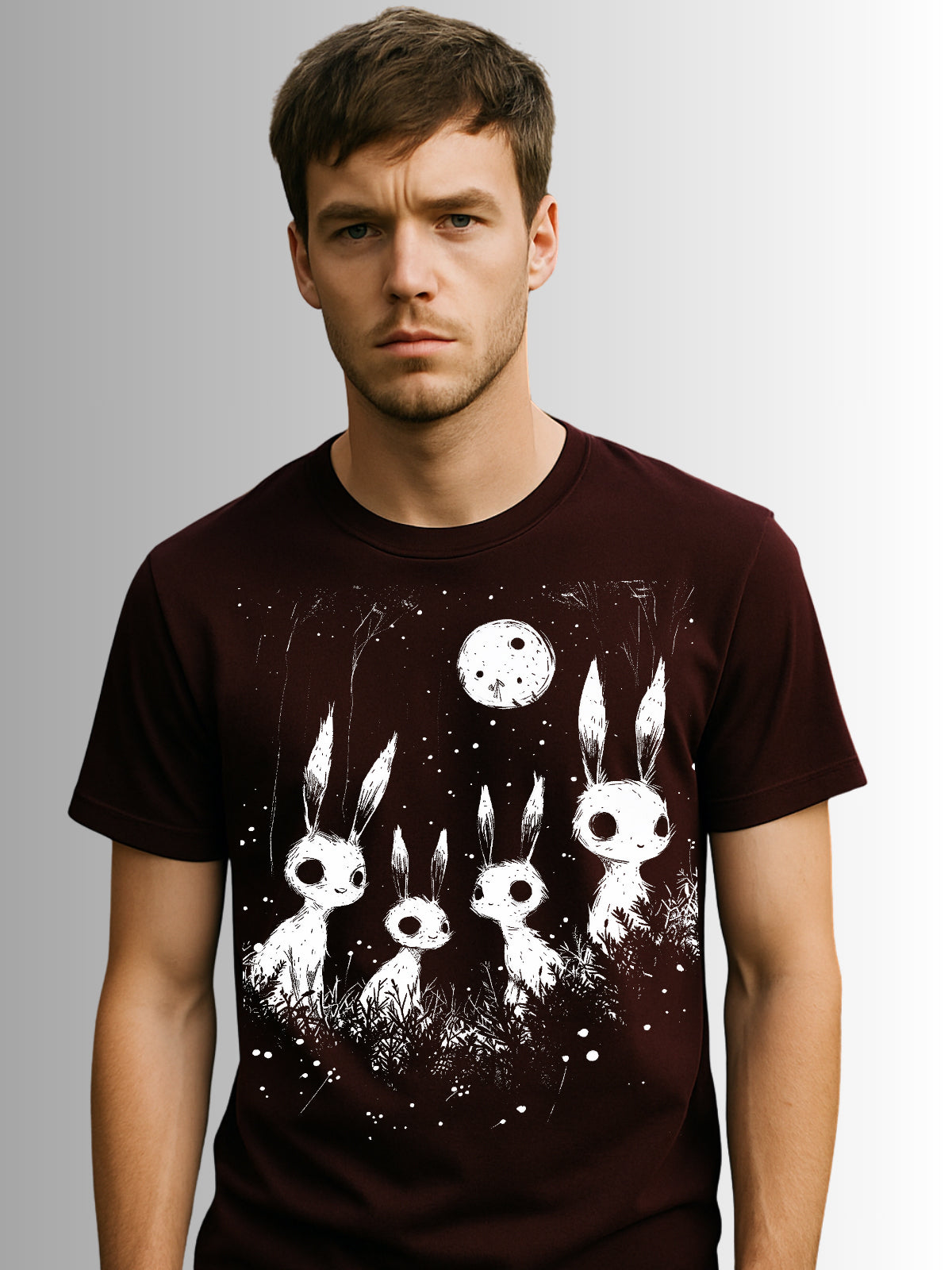 Gothic horror T-shirt with unsettling bunny figures under a moonlit backdrop