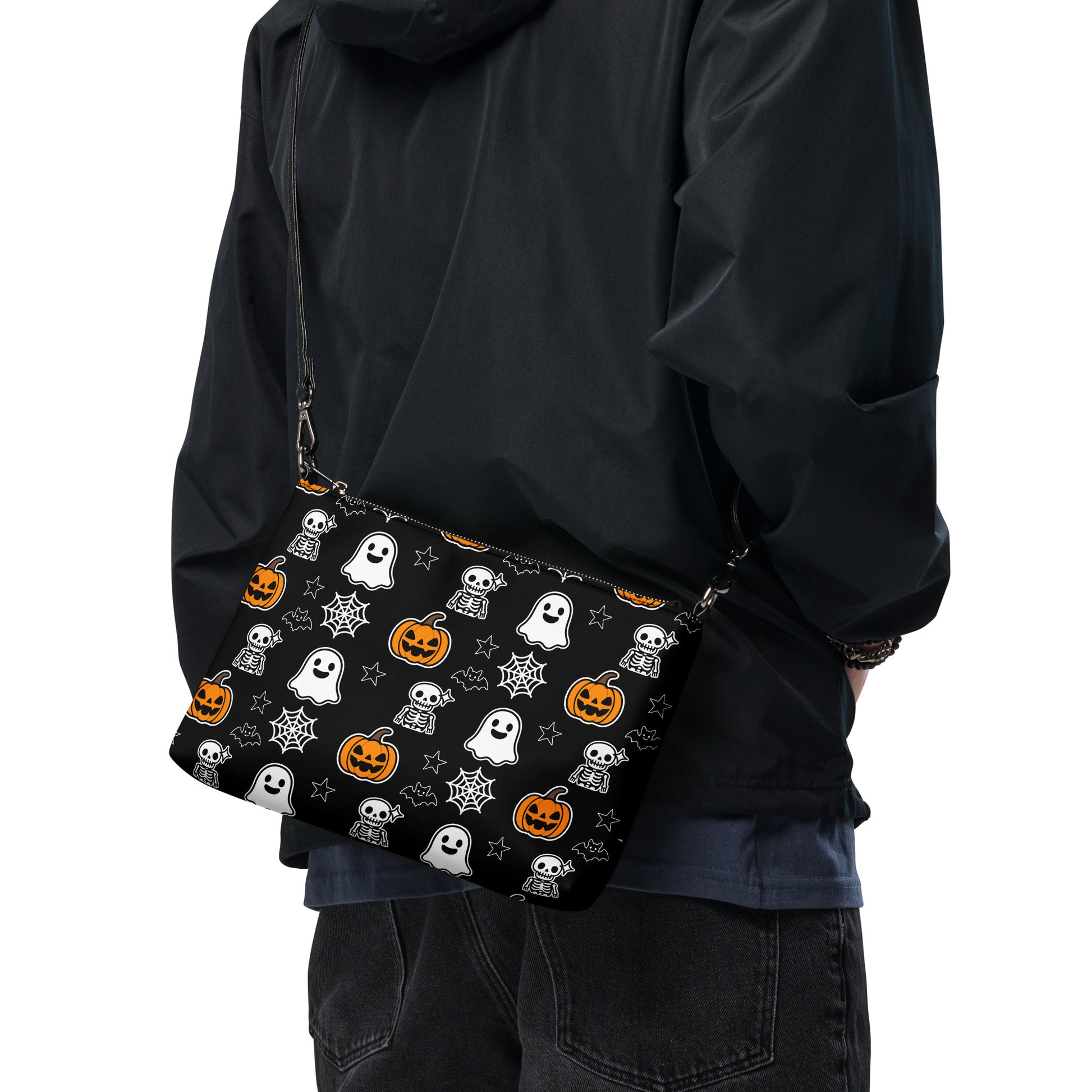 Black alternative fashion crossbody with repeating ghost, skeleton, pumpkin, and spiderweb print