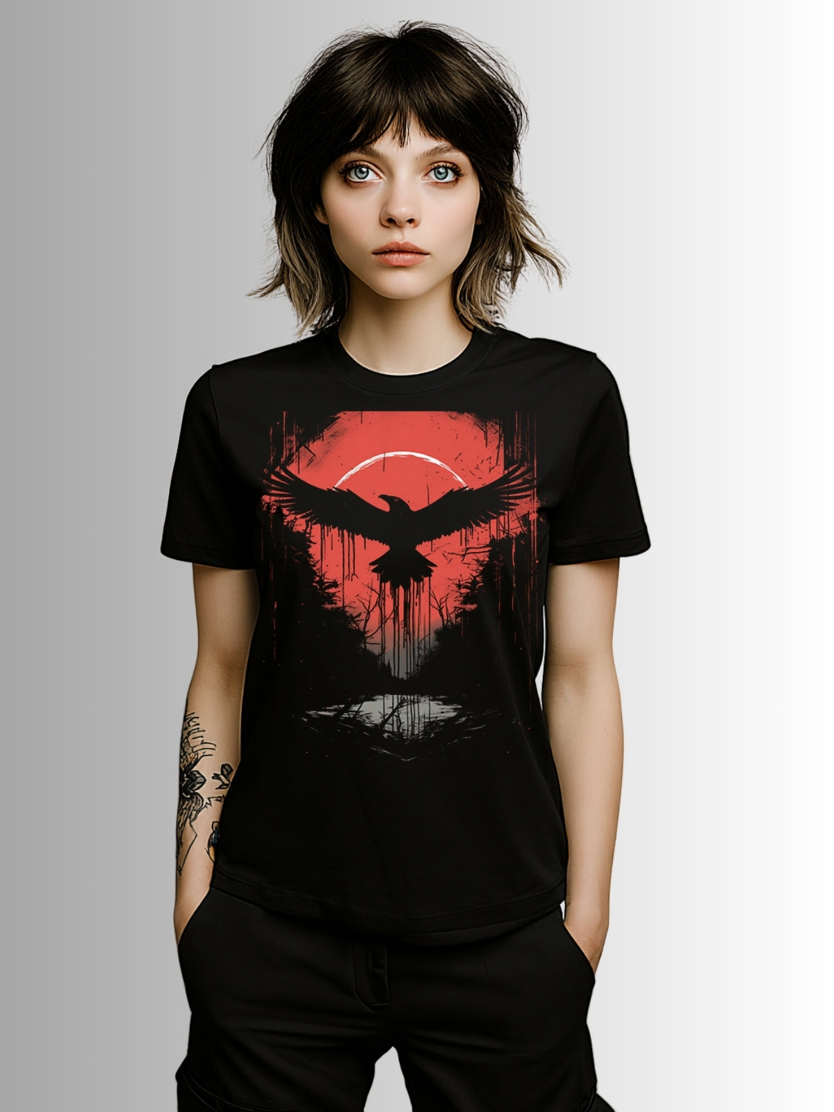 Black gothic tee showcasing a crow in flight over a crimson sky and eerie mirrored water reflection