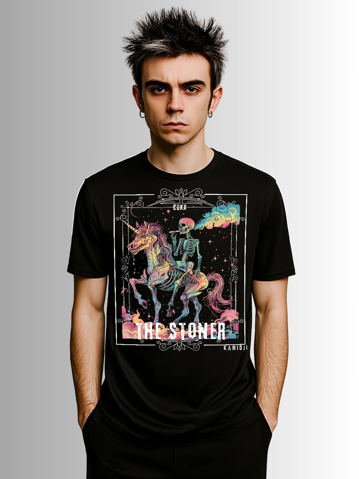 Dark alternative T-shirt featuring pastel gothic art of a skeleton rider on a rainbow-toned unicorn with dreamy smoke clouds