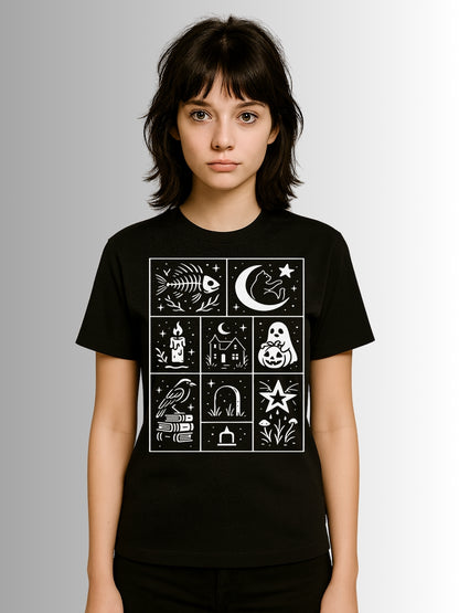 Alternative black T-shirt with playful Halloween pattern of ghosts, pumpkins, candles, and celestial motifs