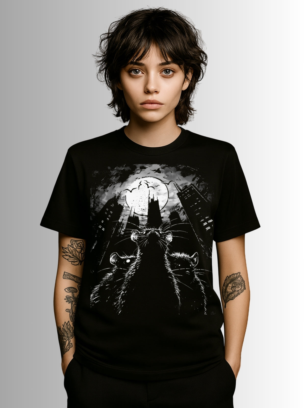 Black alternative tee with detailed line art of rats watching over a crumbling cityscape in monochrome design